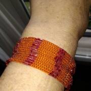 Bijoux, accessoires bracelet en perles orange